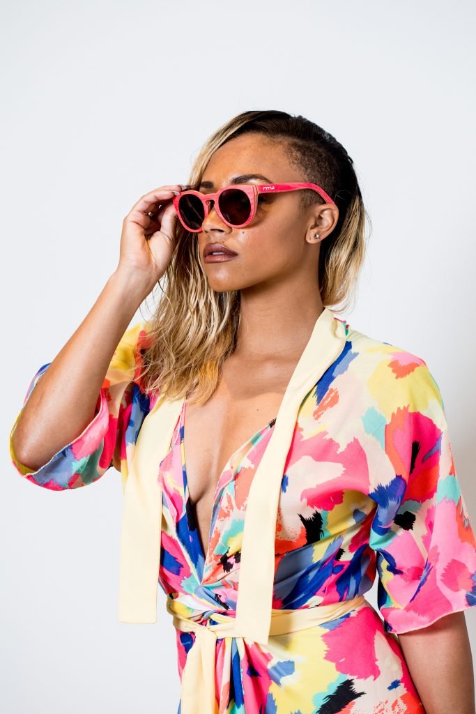 Samantha Johnson in the Bella wrap and sunglasses by lucy laurita